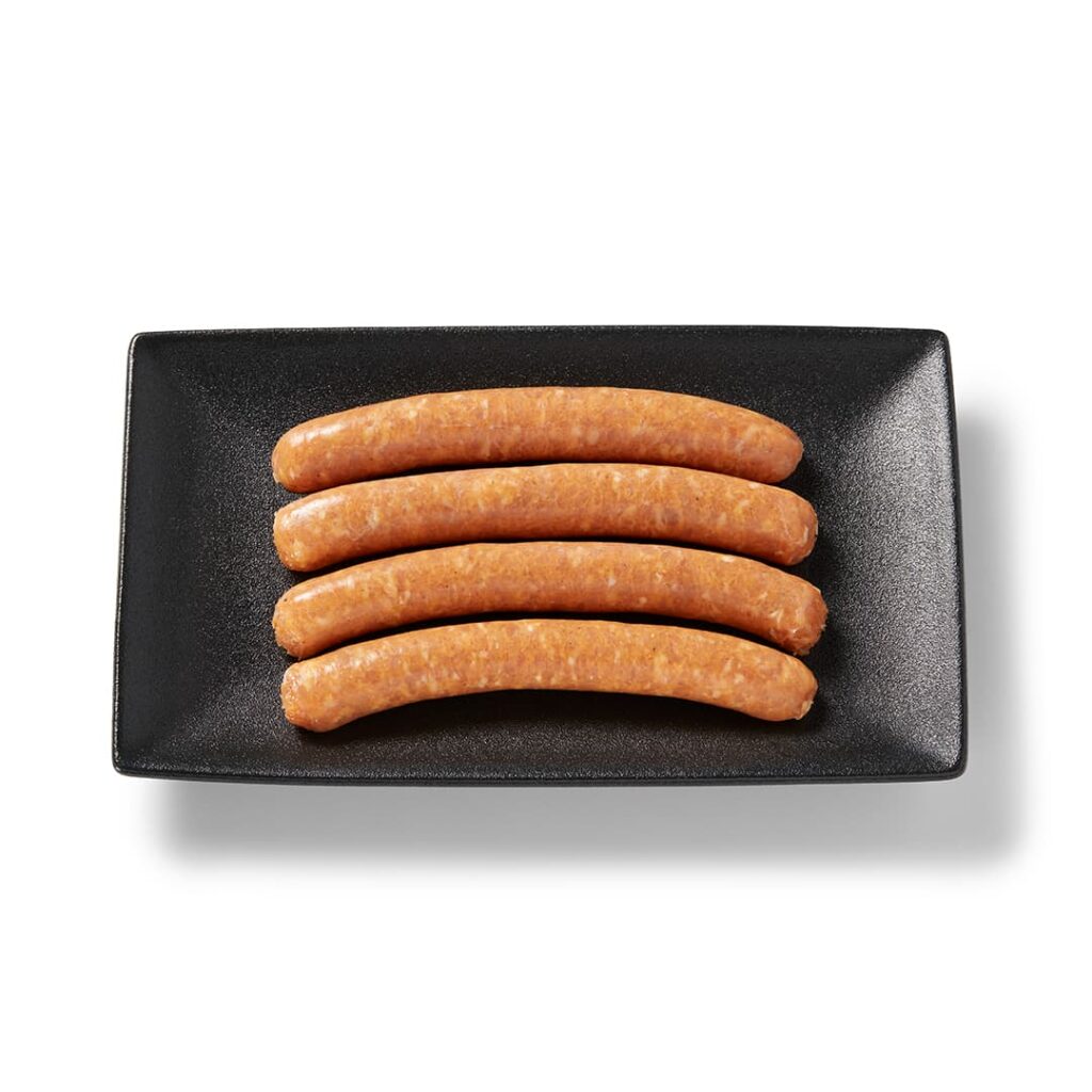 Saucisses BBQ d'été Ferme des Voltigeurs sur plateau de présentation