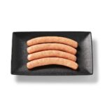 Saucisses de poulet regulière Ferme des Voltigeurs dans un plateau de présentation