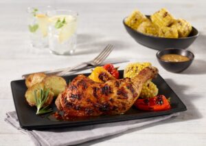 Chicken thigh Ferme des Voltigeurs on a beautiful table.